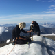 Researcher Gunhild Ninis Rosqvist measures the height of the south peak at Kebnekaise.